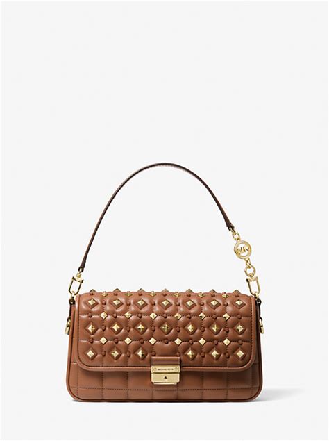 michael michael kors bradshaw small convertible leather shoulder bag|Michael Kors bags with studs.